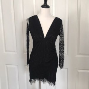Black lace stretchy long sleeved size S dress